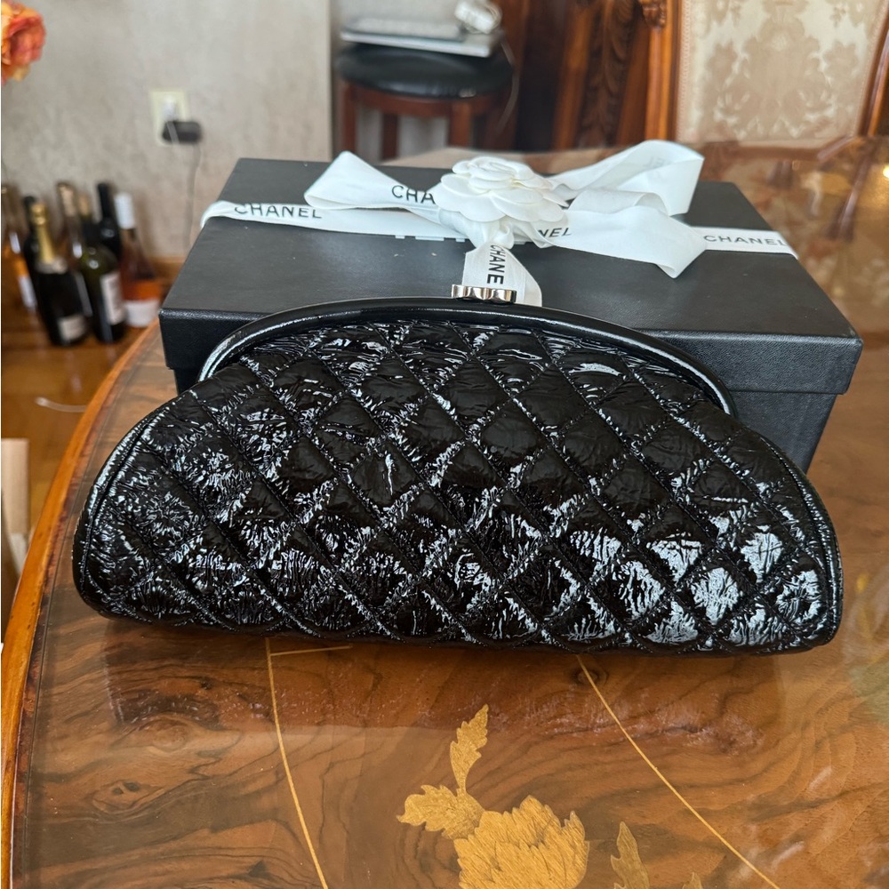100% Authentic Chanel patent leather mademoisell clutch
